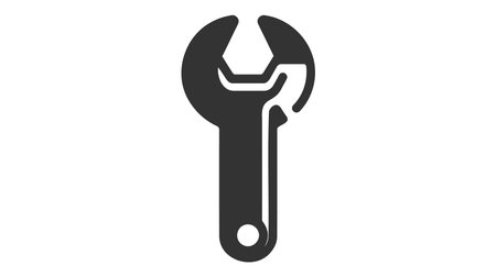 Monochrome vector illustration of a wrench, simple design, isolated on white background.のイラスト素材