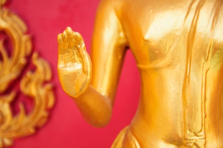 Golden Buddha statue blessing handの写真素材
