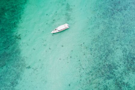 Aerial view on the sea and boat or speedboat. Beautiful natural seascape at the summer time. Island...