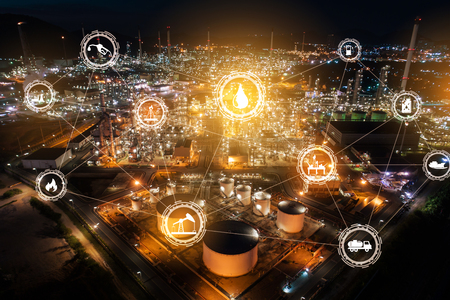 Light oil refinery at twilight with physical system icons diagram on industrial factory. Industry on technology 4.0 concept support with double exposure.のeditorial素材