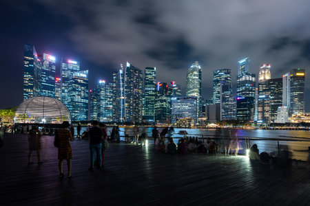 SINGAPORE, August 24, 2023: Marina Bay with Downtown district in Singapore at night.のeditorial素材