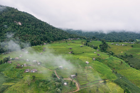 Aerial views of Small house and rice terraces field at pabongpaing village rice terraces Mae-Jam Chiang mai, Thailand. The view point for travel. Rice Field Terraceの写真素材