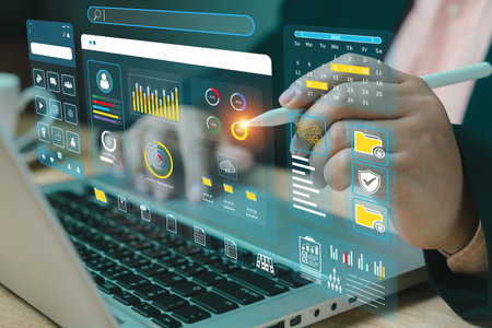 Data science technology and digital marketing. Financial business KPI System data analytics graph dashboard. Analyst uses a computer and dashboard for data business analysis and Data Management Systemの写真素材