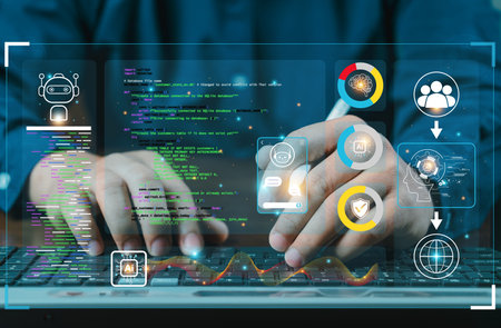 hands using typing keyboard with creative binary coding hologram on blurry background. Software programming code. Technology, web safety and programming concept.の写真素材