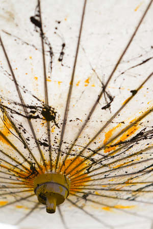 Japanese Mulberry Paper Umbrella Hand Painted with Yellow and Black.の写真素材