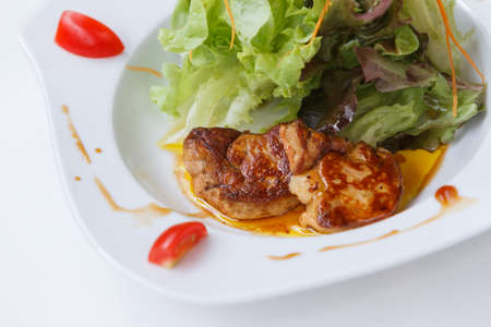 Fried Foir Gras Served with Salad and Sauce.の写真素材