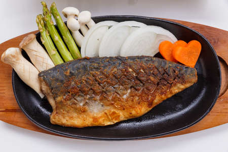 Grilled Japanese Salmon Steak with Mushroom, Asparagus, Sliced Onion and Carrot with Soy Sauce. Scallion Sauce and Mayonnaise.の写真素材