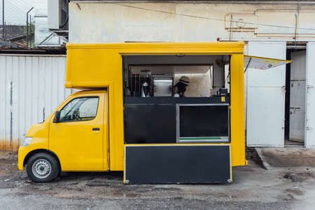 Yellow Cart for Food Truck Pull Over on The Road from The Street of George Town. Penang, Malaysia.のeditorial素材