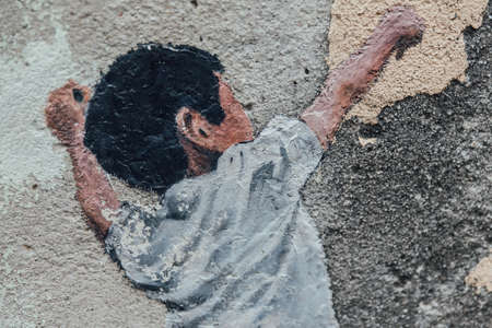 Detail of Painted Children Play Basketball on The Concrete Wall from The Street of George Town. Penang, Malaysia.のeditorial素材