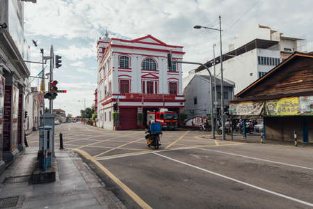 White and red colonial architecture is fire police station on the street at George Town. Penang, Malaysia.のeditorial素材