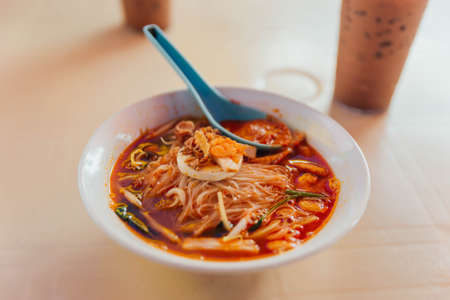 Spicy laksa in the morning market of George Town. Penang, Malaysia.の写真素材