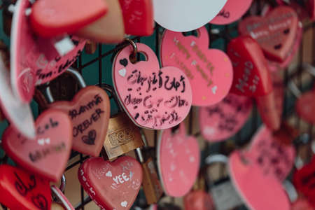 Colorful keychain holded on the bridge is called "Love Lock Penang Hill" from Penang Hill at George Town. Penang, Malaysia.のeditorial素材