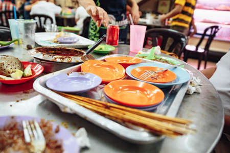 Empty color plates when you finished satay.の写真素材