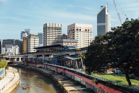 Klang river and cityscape that viewed from sky train station in Kuala Lumpur, Malaysia.のeditorial素材