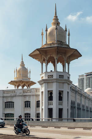 Tower with golden decorated. The National Mosque of Malaysia is a mosque in Kuala Lumpur, Malaysia. It has a capacity for 15,000 people and is situated among 13 acres (53,000 m2) of beautiful gardens.のeditorial素材