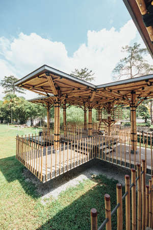 Bamboo playhouse built on a lake island in Kuala Lumpur's botanical gardens, Malaysia.のeditorial素材