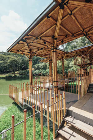 Bamboo playhouse built on a lake island in Kuala Lumpur's botanical gardens, Malaysia.のeditorial素材