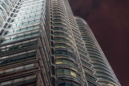 Building skin of Twin Towers at night in Kuala Lumpur, Malaysiaのeditorial素材