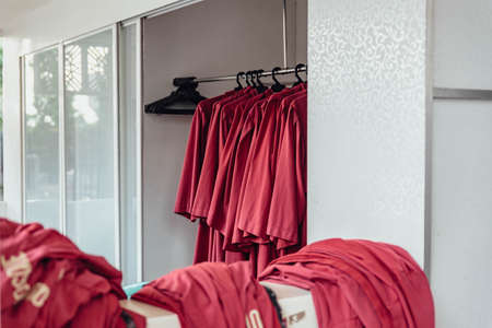 Red cloaks for tourists in Putra Mosque in Wilayah Persekutuan Putrajaya, Malaysiaの写真素材