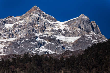 Mountain with little snow on the top sunlight in the morning at Lachen in North Sikkim, India.の写真素材