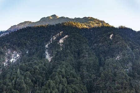 Green mountain with little snow on the top sunlight in the morning at Lachen in North Sikkim, India.の写真素材
