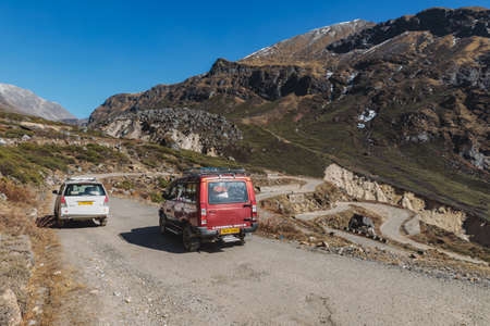 Yumthang Valley that view from high level to see the devious road line with cars in winter at Lachung. North Sikkim, India.のeditorial素材