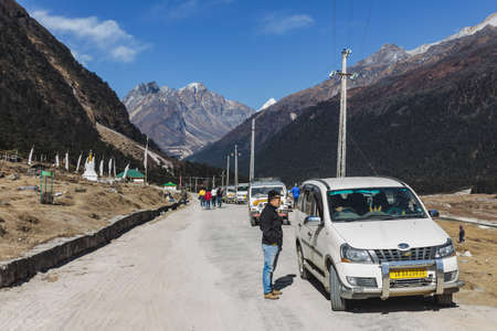 Yumthang Valley with road line and tourist cars in winter at Lachung. North Sikkim, India.のeditorial素材