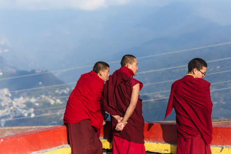 Tibetan monks watched the view in upper level of Rumtek Monastery near Gangtok. Sikkim, Indiaのeditorial素材