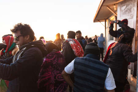 Tourists on the Tiger Hill with sunlight in the background in winter at Tiger Hill, Darjeeling. India.のeditorial素材