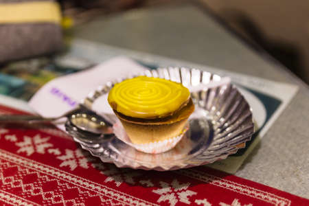 Lemon Tart at cafe in winter in Darjeeling, India.