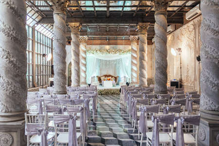 Wedding ceremony place with stage and seats for guests with exotic design in Bangkok, Thailand.のeditorial素材