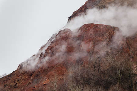 Close up Mount Usu with snow and fog on the top near Noboribetsu Bear Park in Hokkaido, Japan.の写真素材