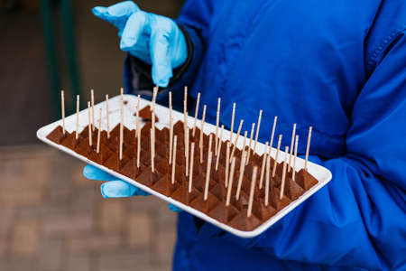 Pyramid form chocolates with tooth pick that free to try in Hokkaido, Japan.