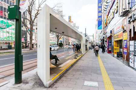 Modern bus stop on the street at Sapporo in Hokkaido, Japan.のeditorial素材