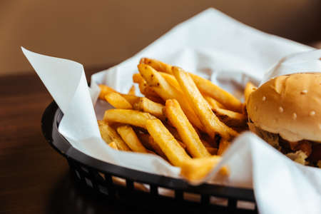 Burger set served with french fried and ketchup.