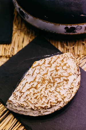 Brie is a soft cow's-milk cheese named after Brie. Cut for sell.の写真素材