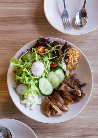 Luang Prabang Salad style with grilled pork served with yolk salad dressing.の写真素材