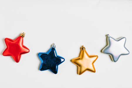 Isolated Many colors of Metallic stars such as red, blue, golden and silver for Christmas and Happy New Year celebration.の写真素材