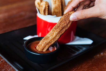 Traditional Spanish dessert Churros with sugar and cinnamonの写真素材