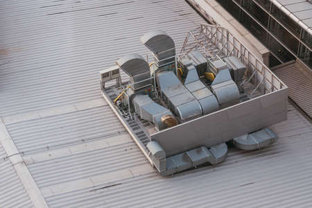 Custom design industrial ventilation system on the top of the building.の写真素材