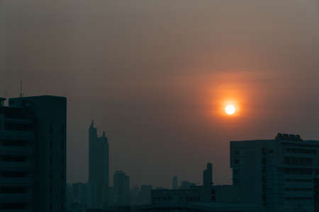 Air pollution effect made low visibility cityscape with haze and fog from dust in the air during...