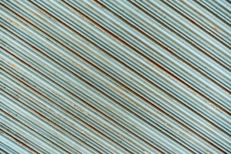 Rotate 45-degree Steel rustic vintage rolling door. Rustic shutter door texture rotate . Perfect for background.の写真素材