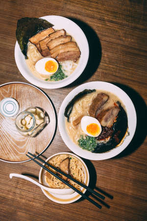 Top view of Ramen Pork Bone Soup (Tonkotsu Ramen) with Chashu Pork, Scallion, Sprout, Onion, Menma...