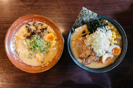 Top view of Ramen Pork Bone Soup (Tonkotsu Ramen) with Chashu Pork, Scallion, Sprout, Corn, Dried Seaweed and boiled eggs.の写真素材