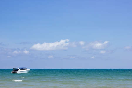 Speedboat is floating over the sea with blue sky and cloud in summer in Koh Mak Island at Trat,...