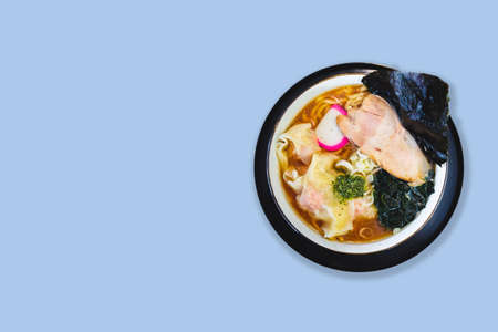 Isolated top view of Ramen Pork Bone Soup (Tonkotsu Ramen) with Chashu Pork, Scallion, Wanton, Menma...