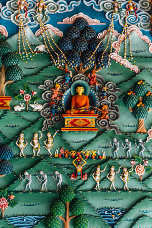 Decorated wall that tell about Buddha story in Bhutanese art inside The Royal Bhutanese Monastery in Bodh Gaya, Bihar, India.のeditorial素材