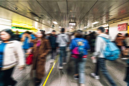 Moving diversity of people walking inside Taipei Main Station in Taiwan.のeditorial素材