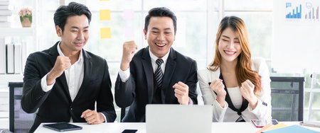 Happy for the success of the professional Asian business adviser meeting to analyze and discuss the...