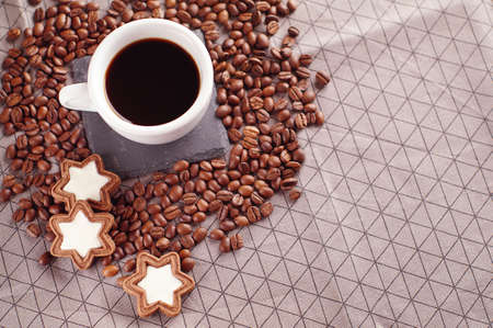 Coffee cup or hot chocolate with cookies, Top view, space for text.の写真素材
